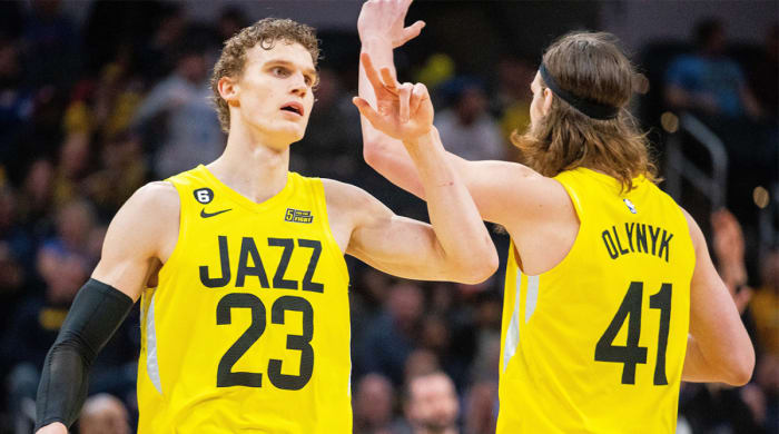 Jazz’s Lauri Markkanen, Kelly Olynyk celebrate.